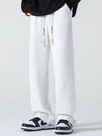 Pantaloni a gamba dritta con motivo a scacchiera texturizzato
